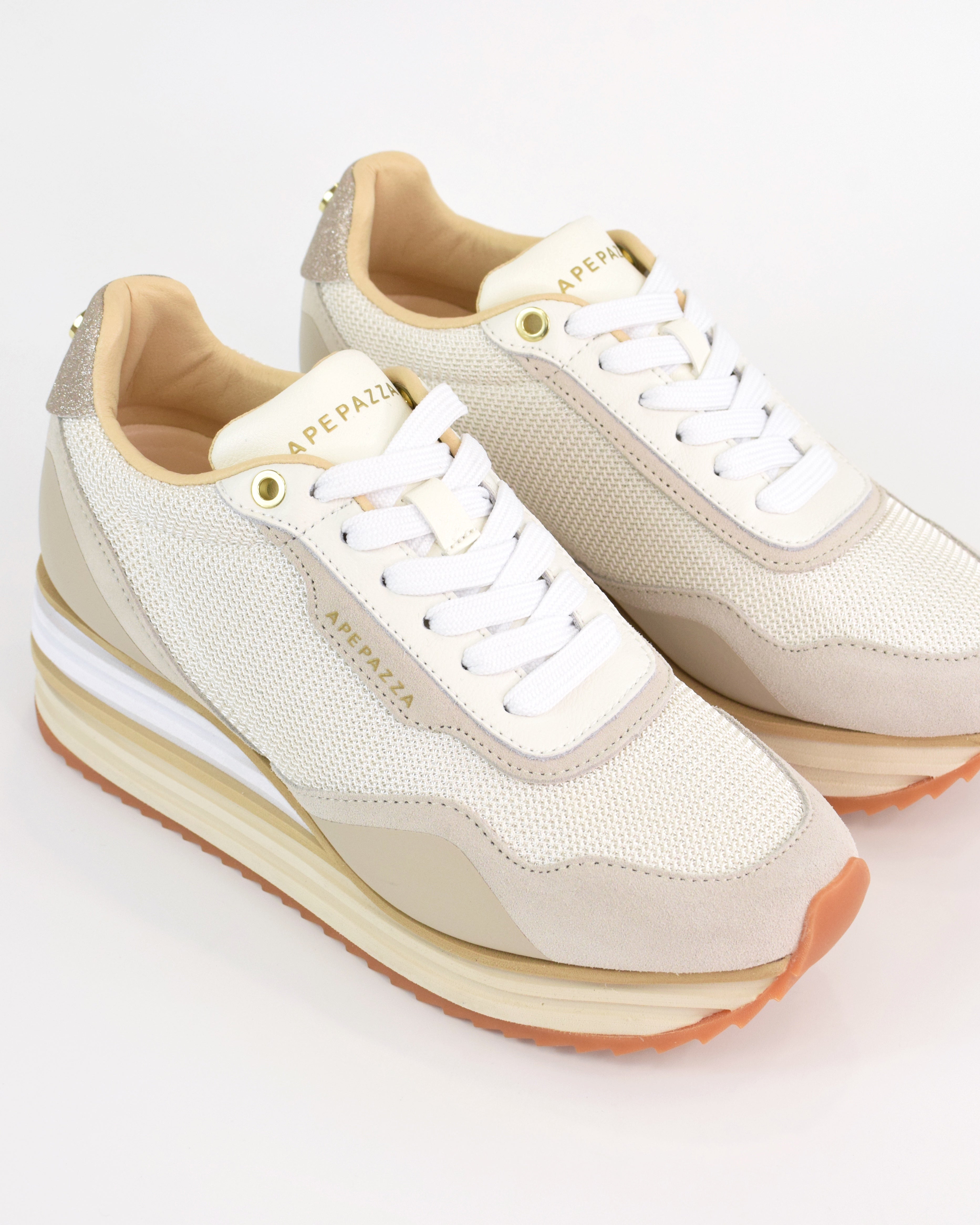 Sneaker in pelle e tessuto tecnico con zeppa e platform Laura
