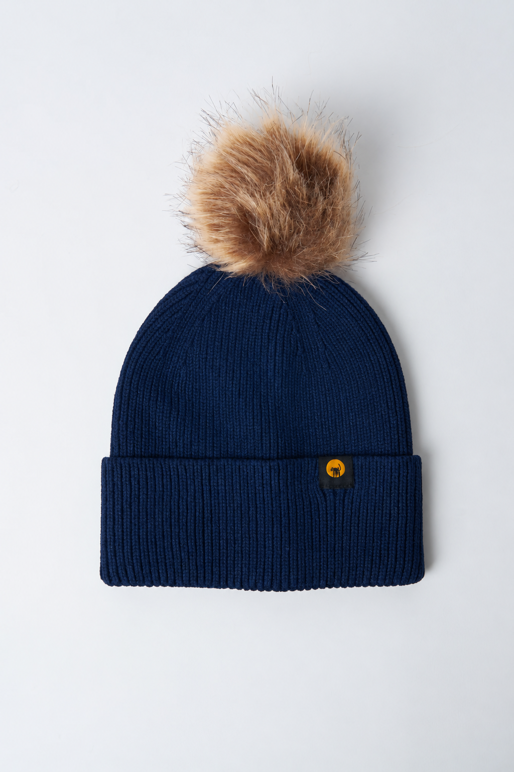 Cappellino in maglia con pompon Vega