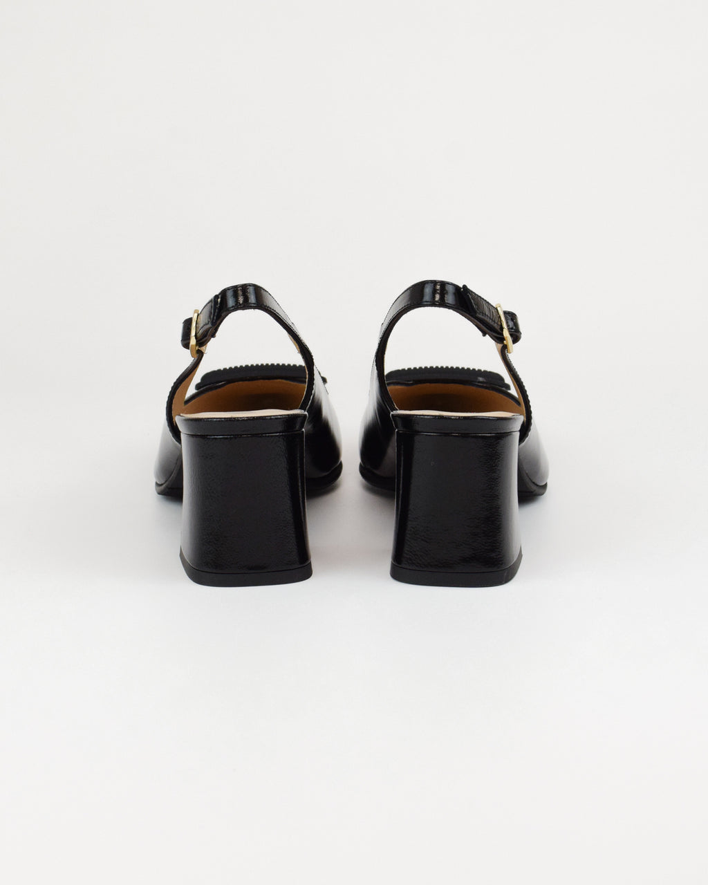 Slingback in vernice con accessorio