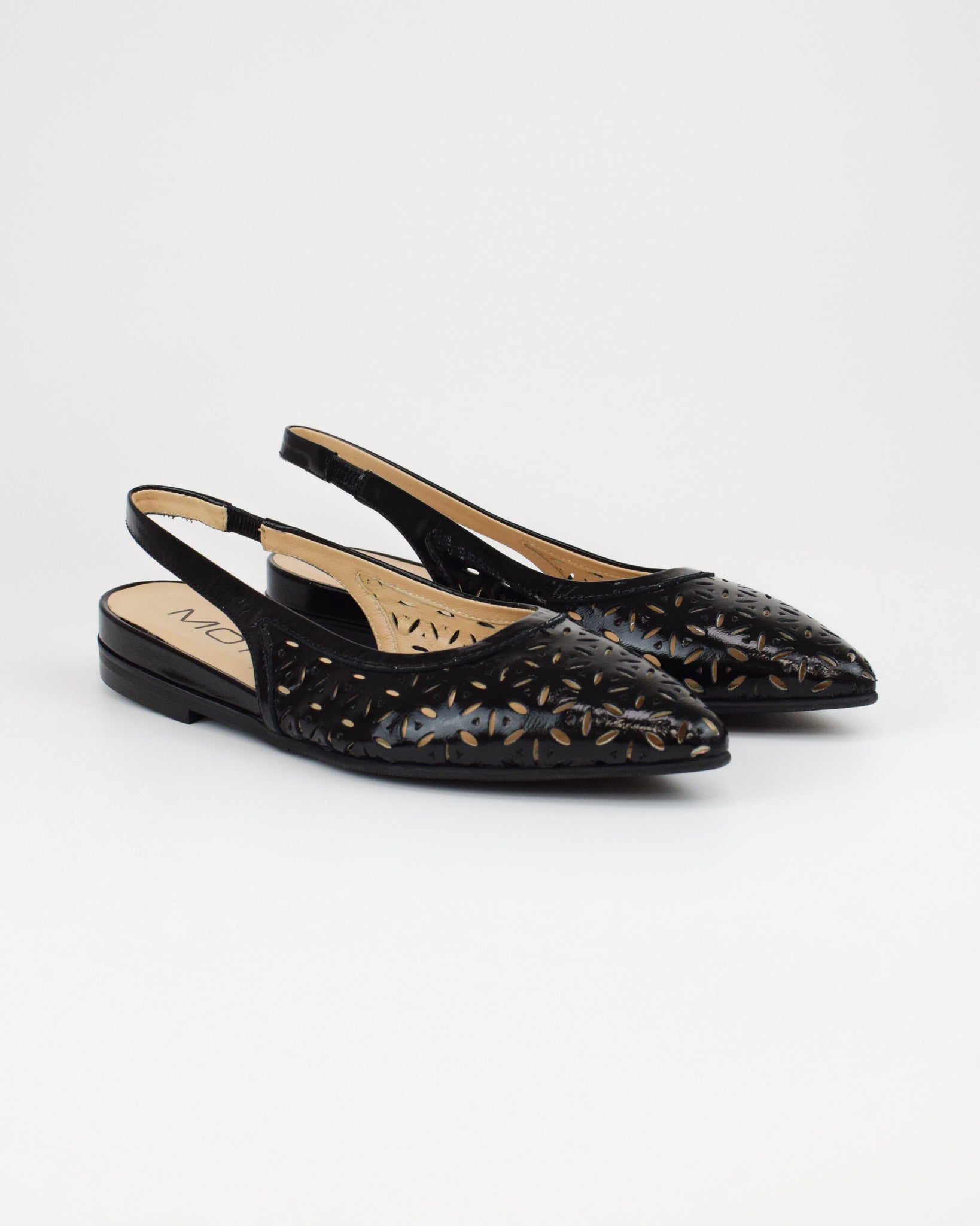 Slingback in pelle traforata