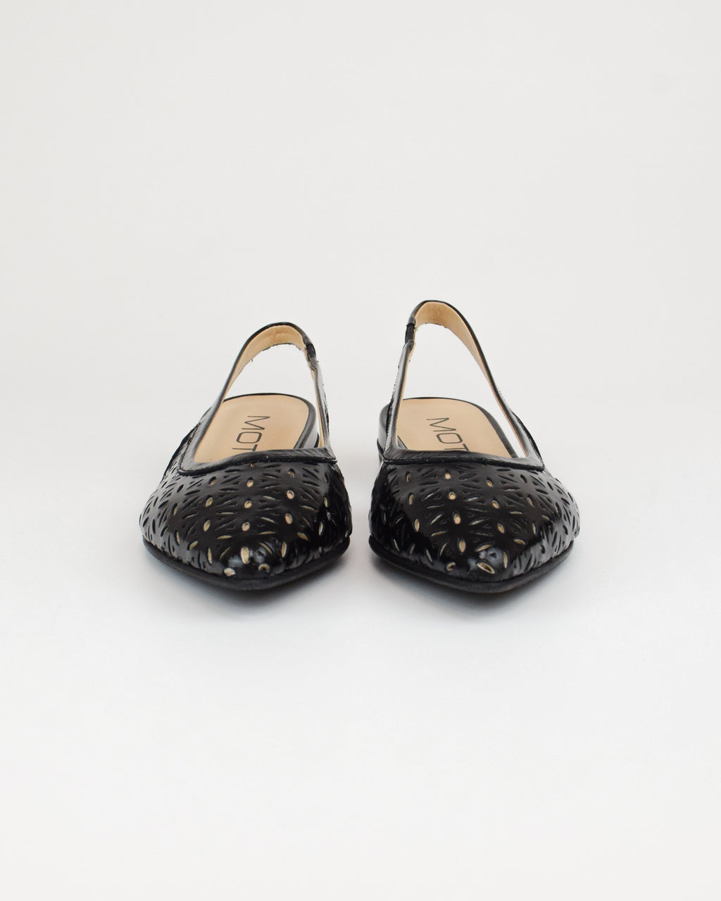 Slingback in pelle traforata