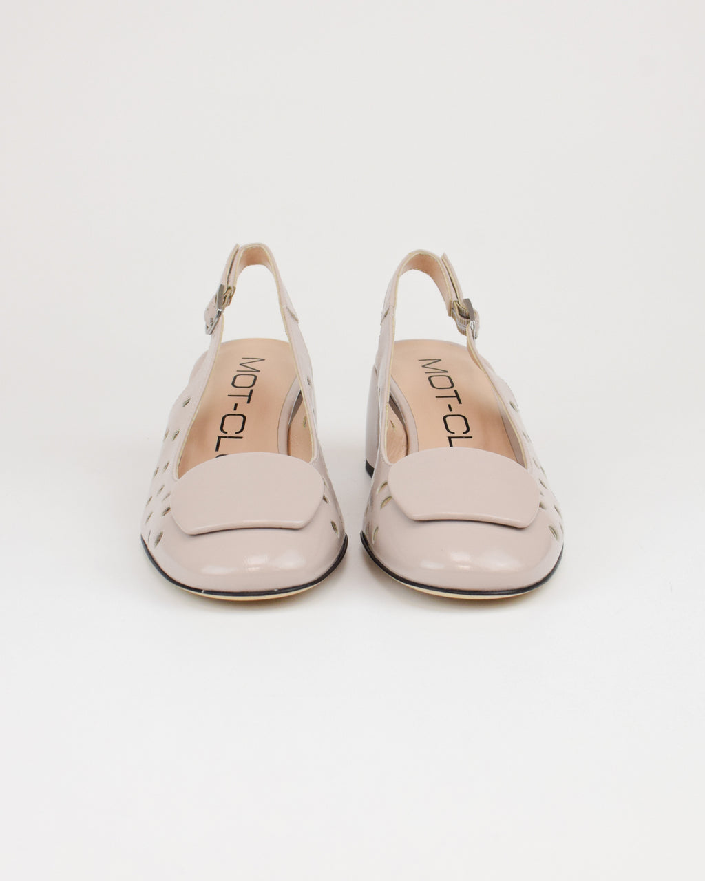 Slingback in vernice traforata