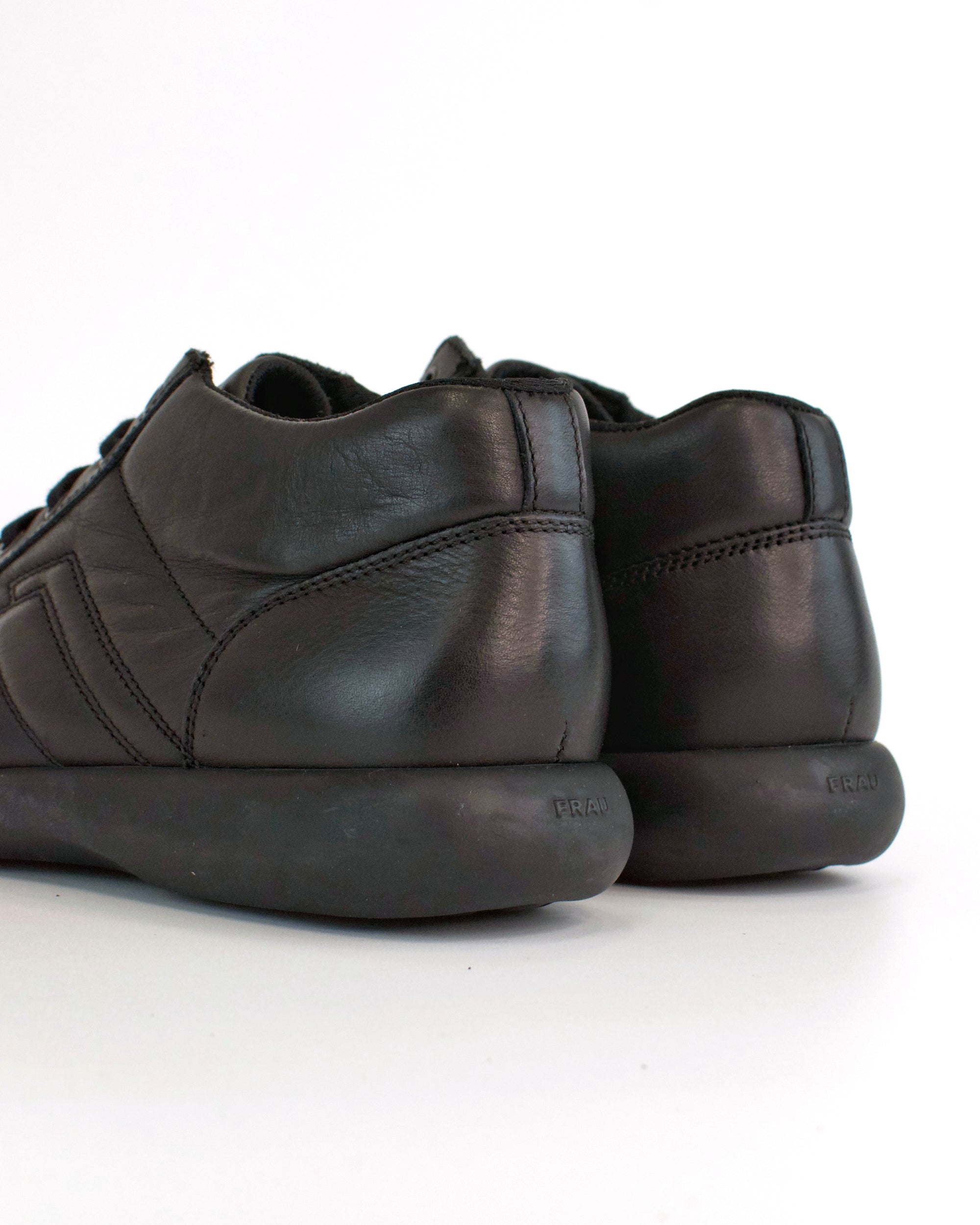 Sneaker casual alta in pelle