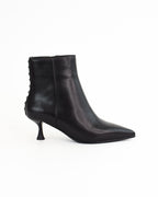 Tronchetto Nunzia in pelle con borchie