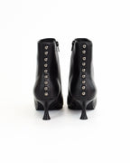 Tronchetto Nunzia in pelle con borchie