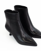 Tronchetto Nunzia in pelle con borchie