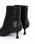 Tronchetto Nunzia in pelle con borchie