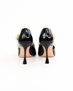 Décolleté in vernice lucida con fiocco