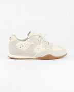 Sneaker con fiocco in perle