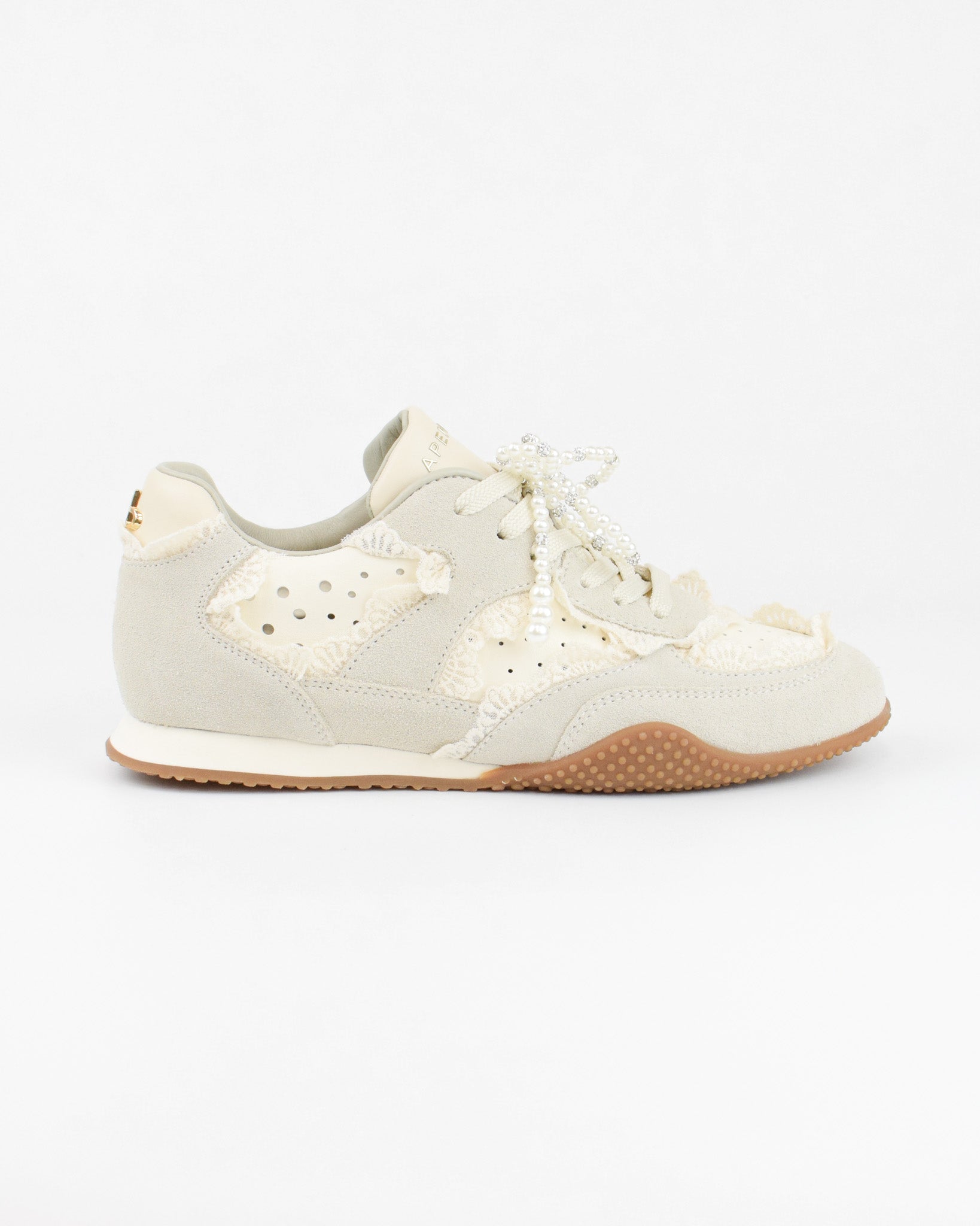 Sneaker con fiocco in perle