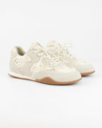 Sneaker con fiocco in perle