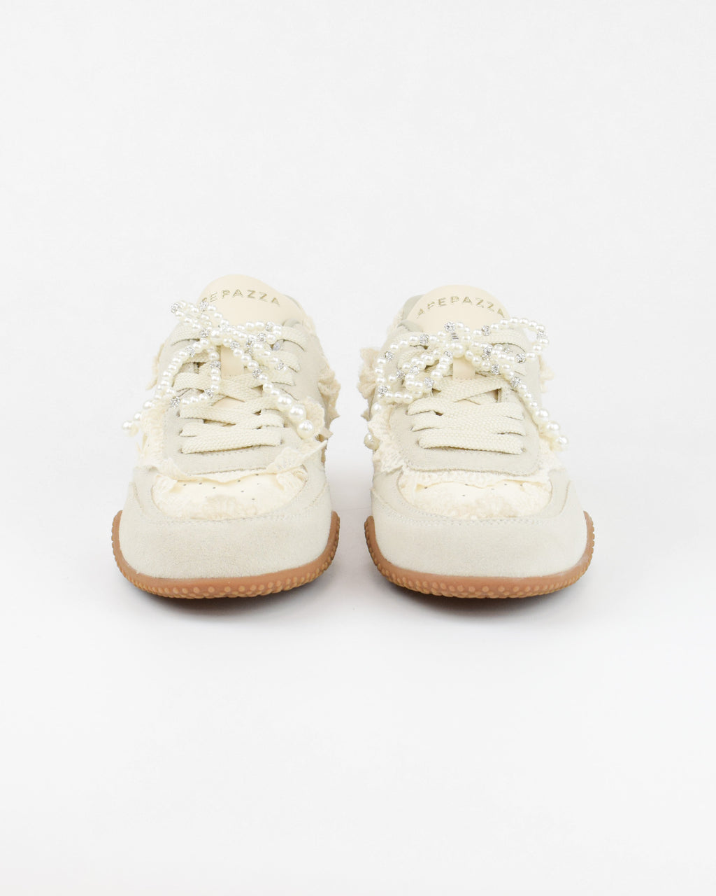 Sneaker con fiocco in perle