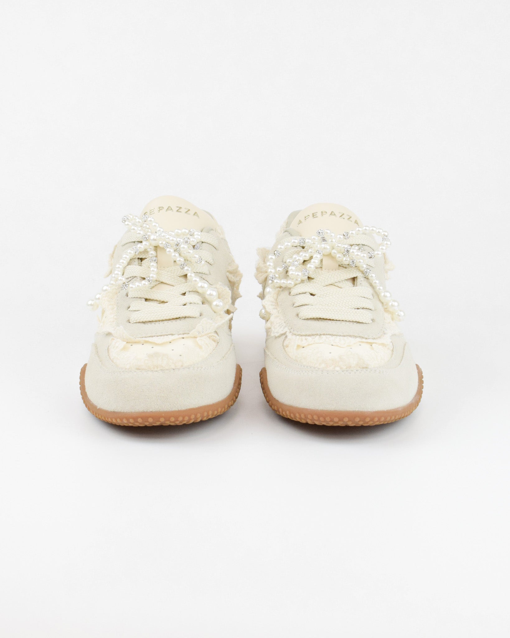 Sneaker con fiocco in perle