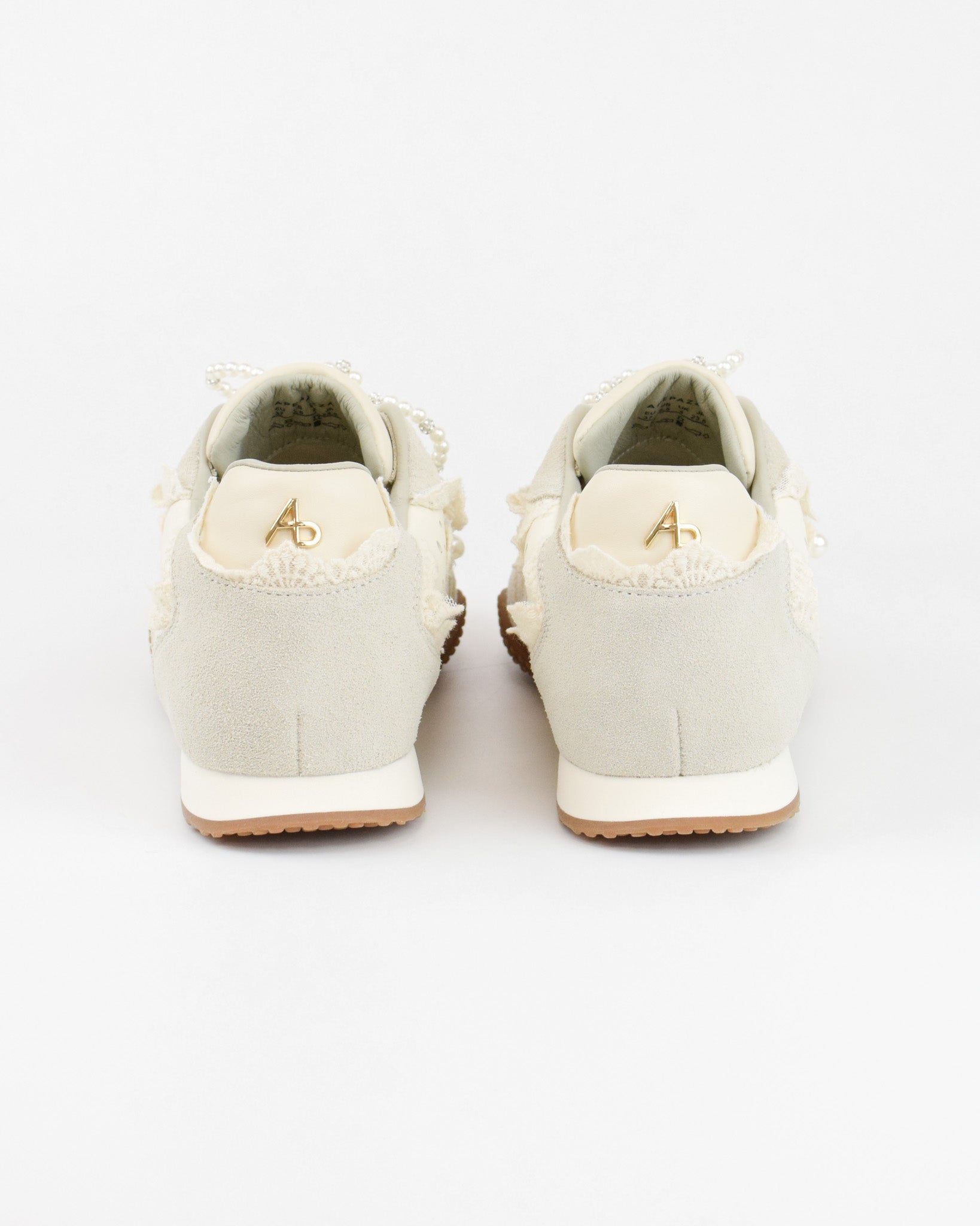 Sneaker con fiocco in perle