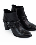 Tronchetto in pelle con dettagli cinturino