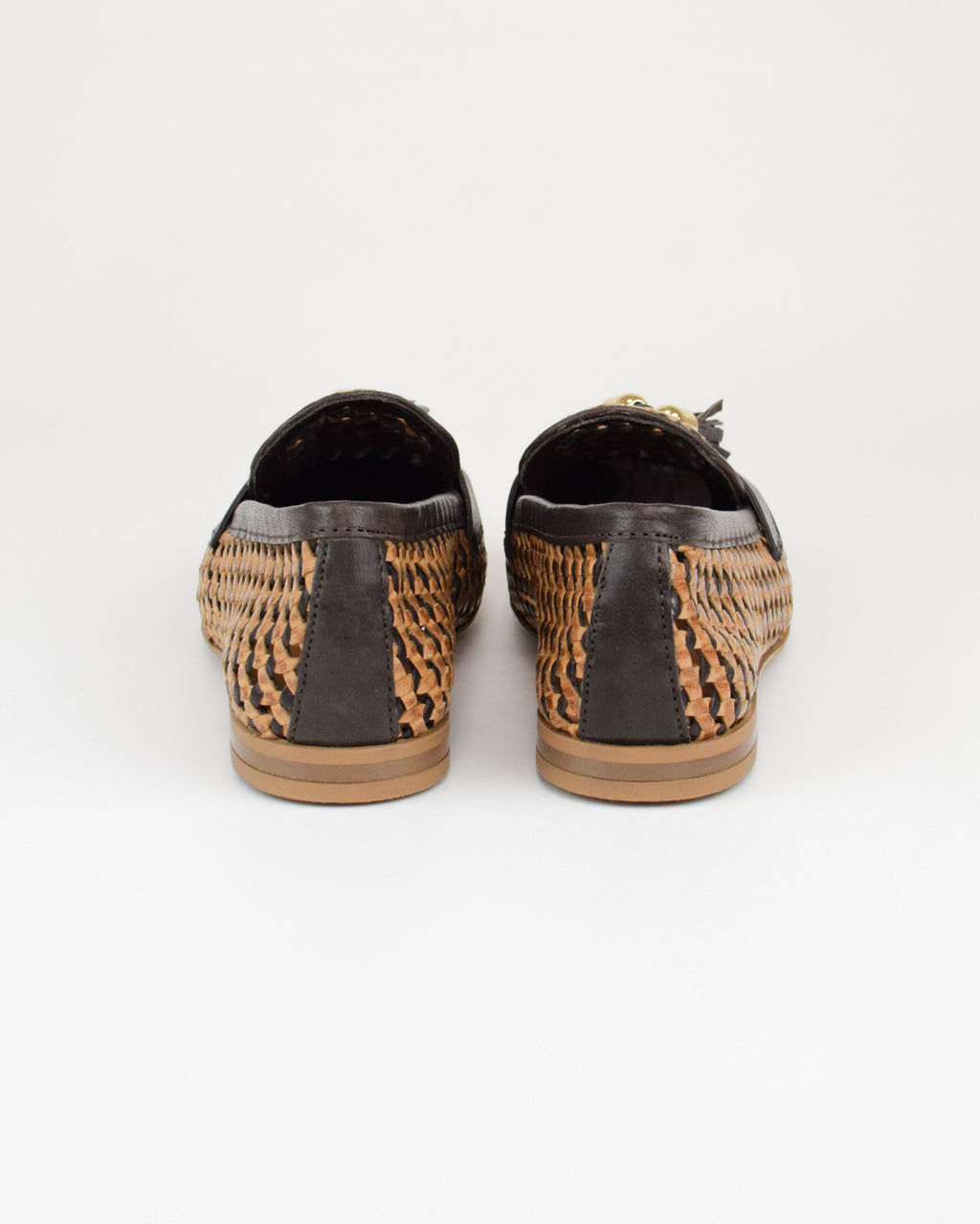 Mocassino in pelle intrecciata con nappine