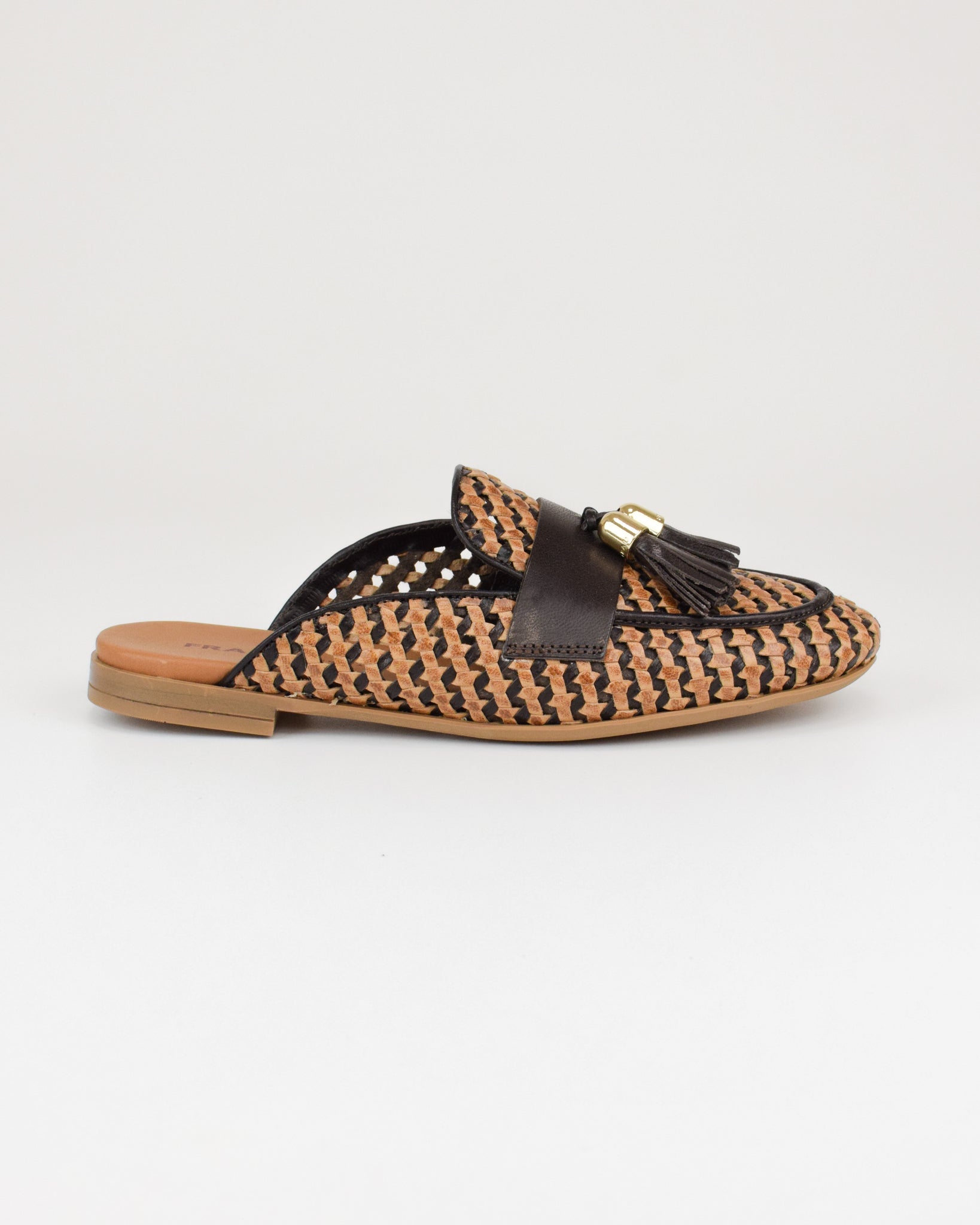 Sabot in pelle intrecciata con nappine