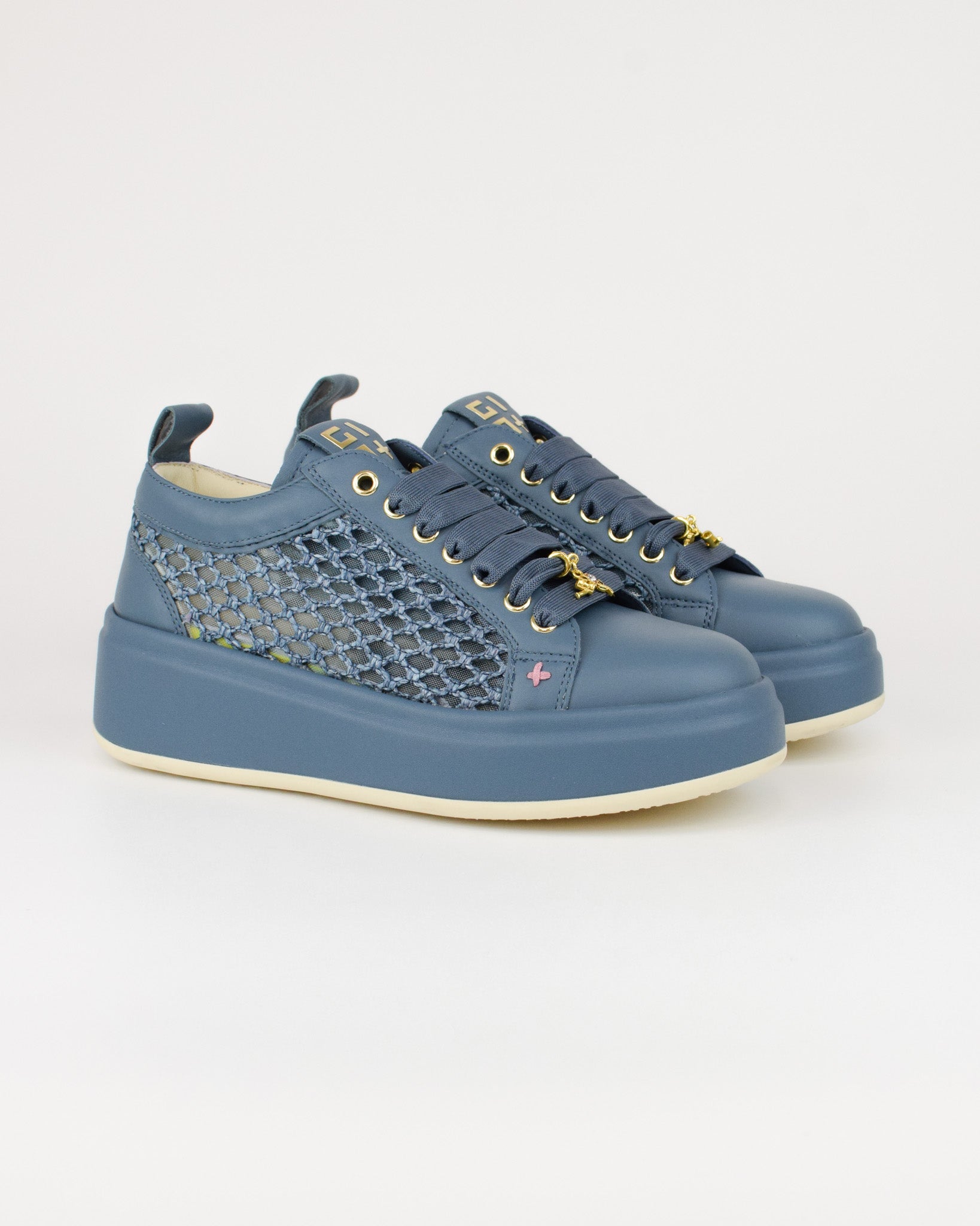 Sneaker in pelle e rafia