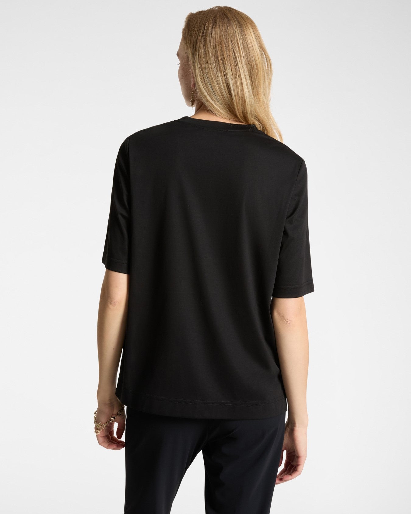 T-shirt con piccola libellula in strass