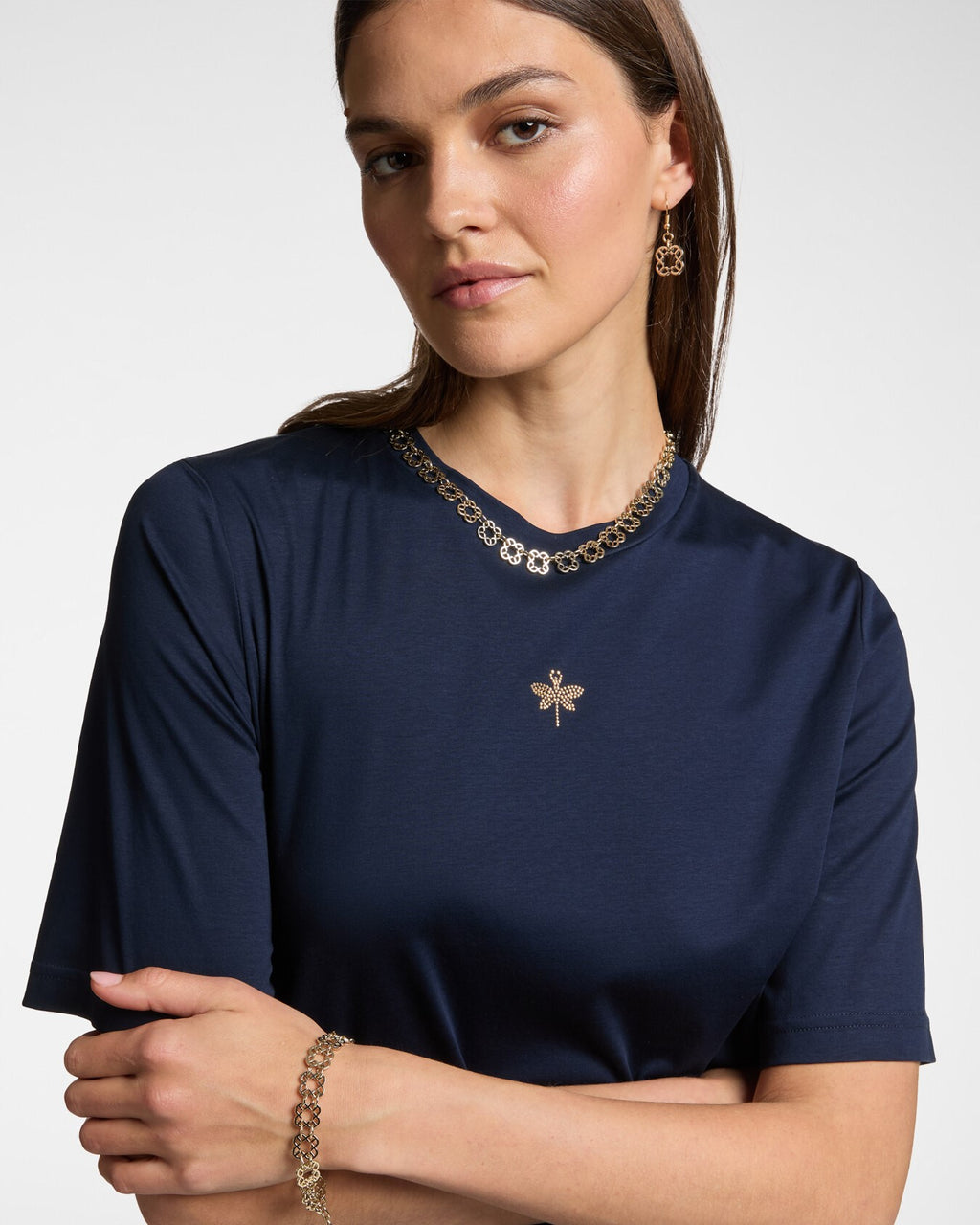 T-shirt con piccola libellula in strass