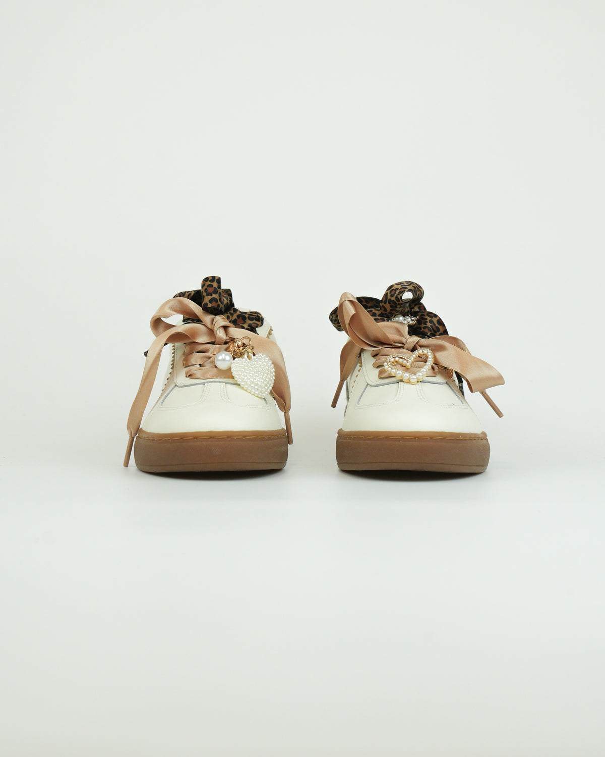 Sneaker con lacci in raso e dettagli animalier