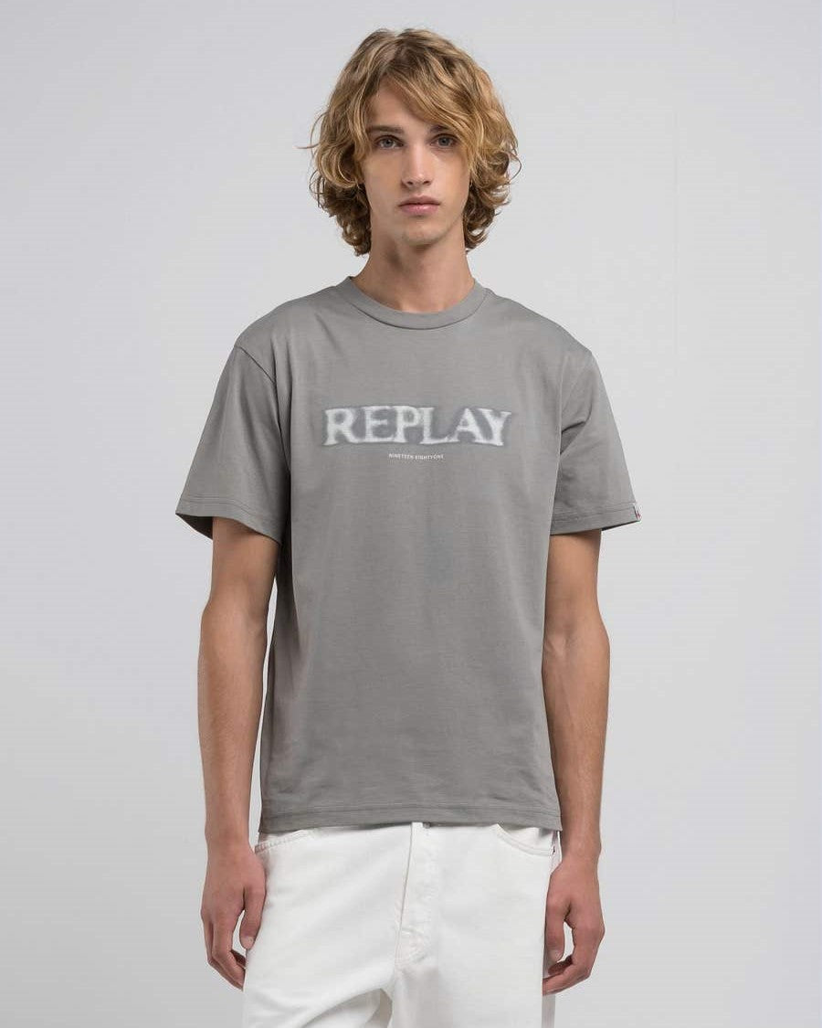 T-Shirt con lettering sfocato