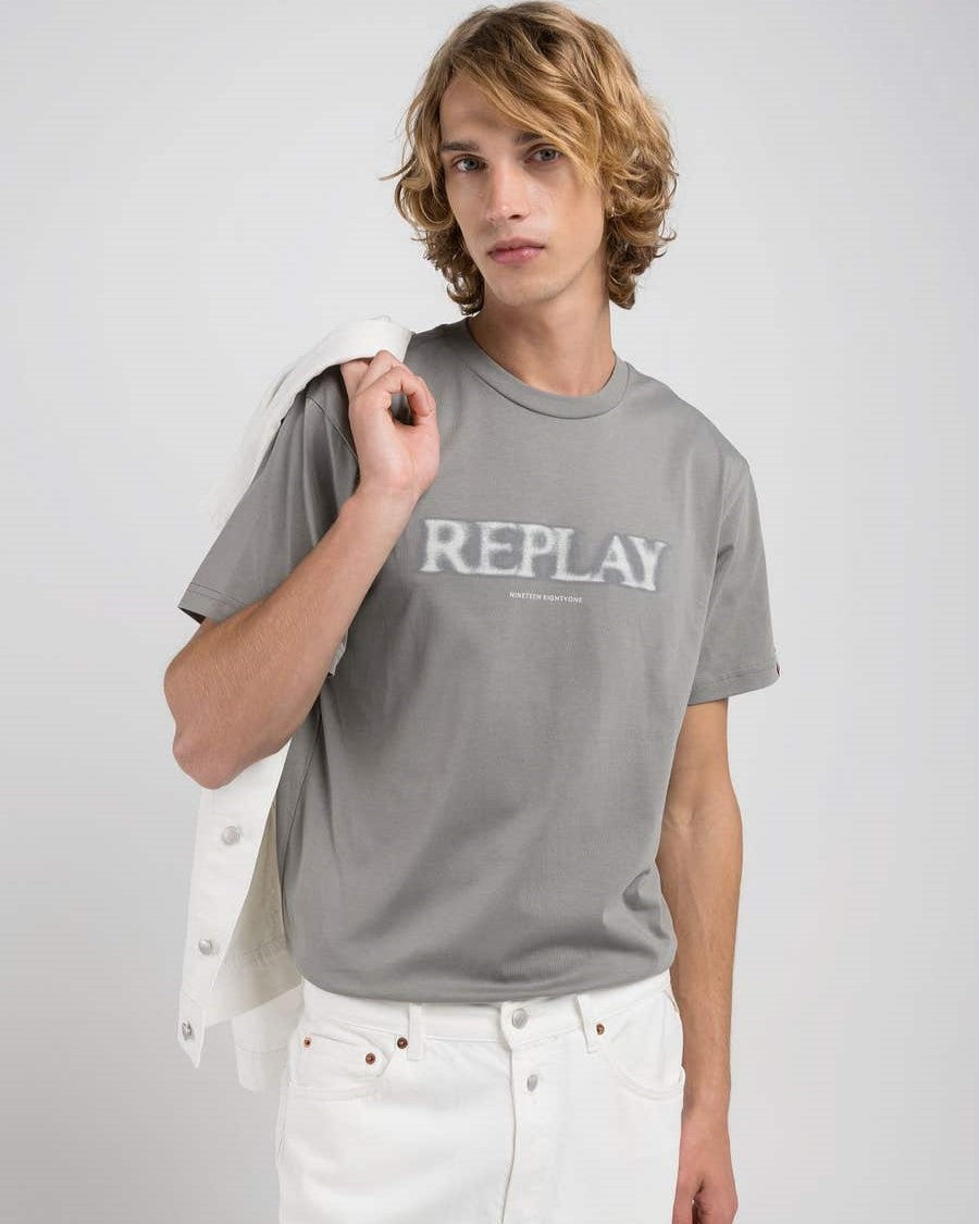 T-Shirt con lettering sfocato