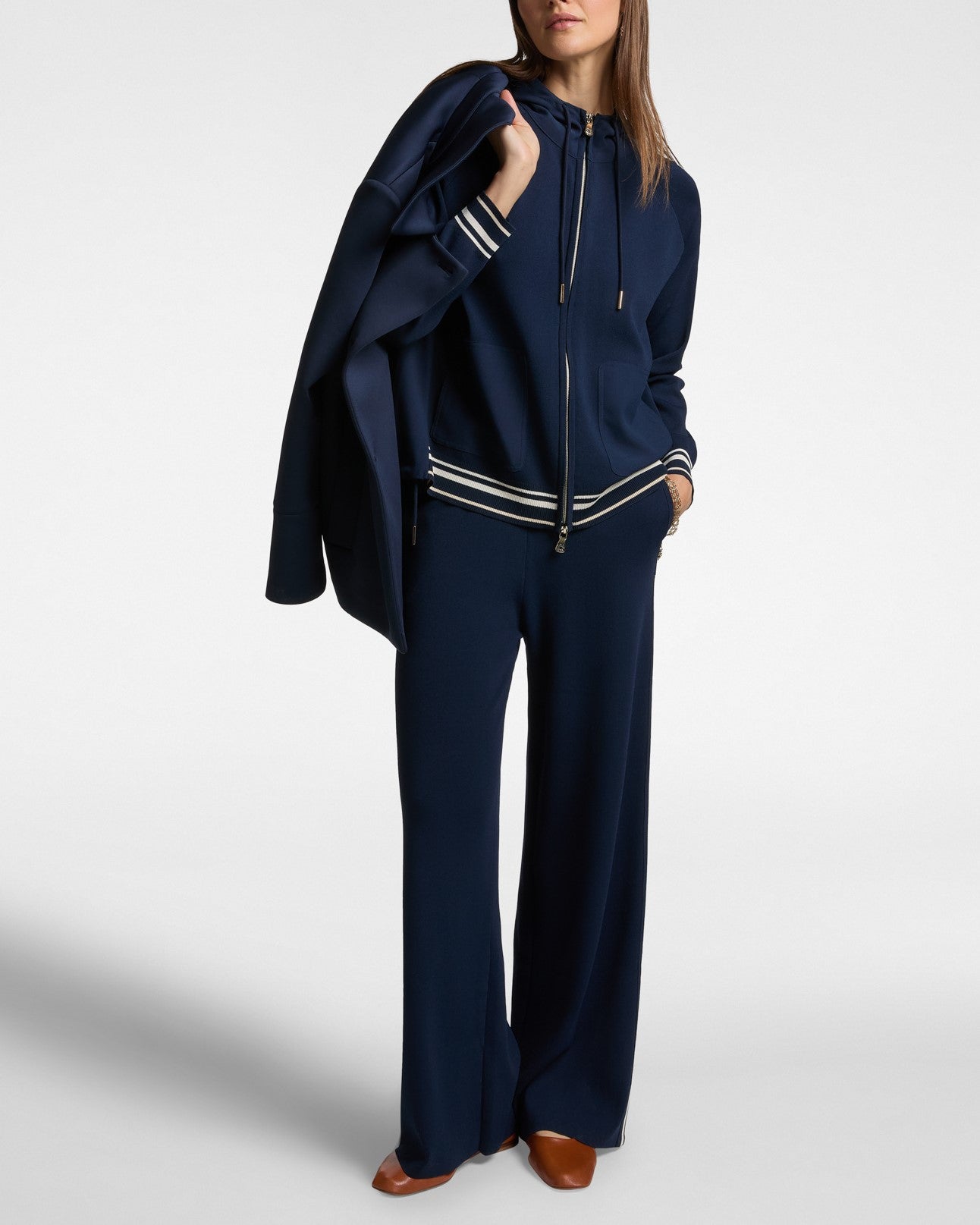 Pantaloni in maglia con bordi a righe