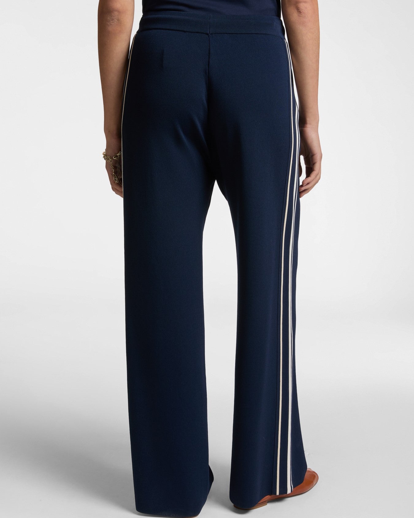 Pantaloni in maglia con bordi a righe