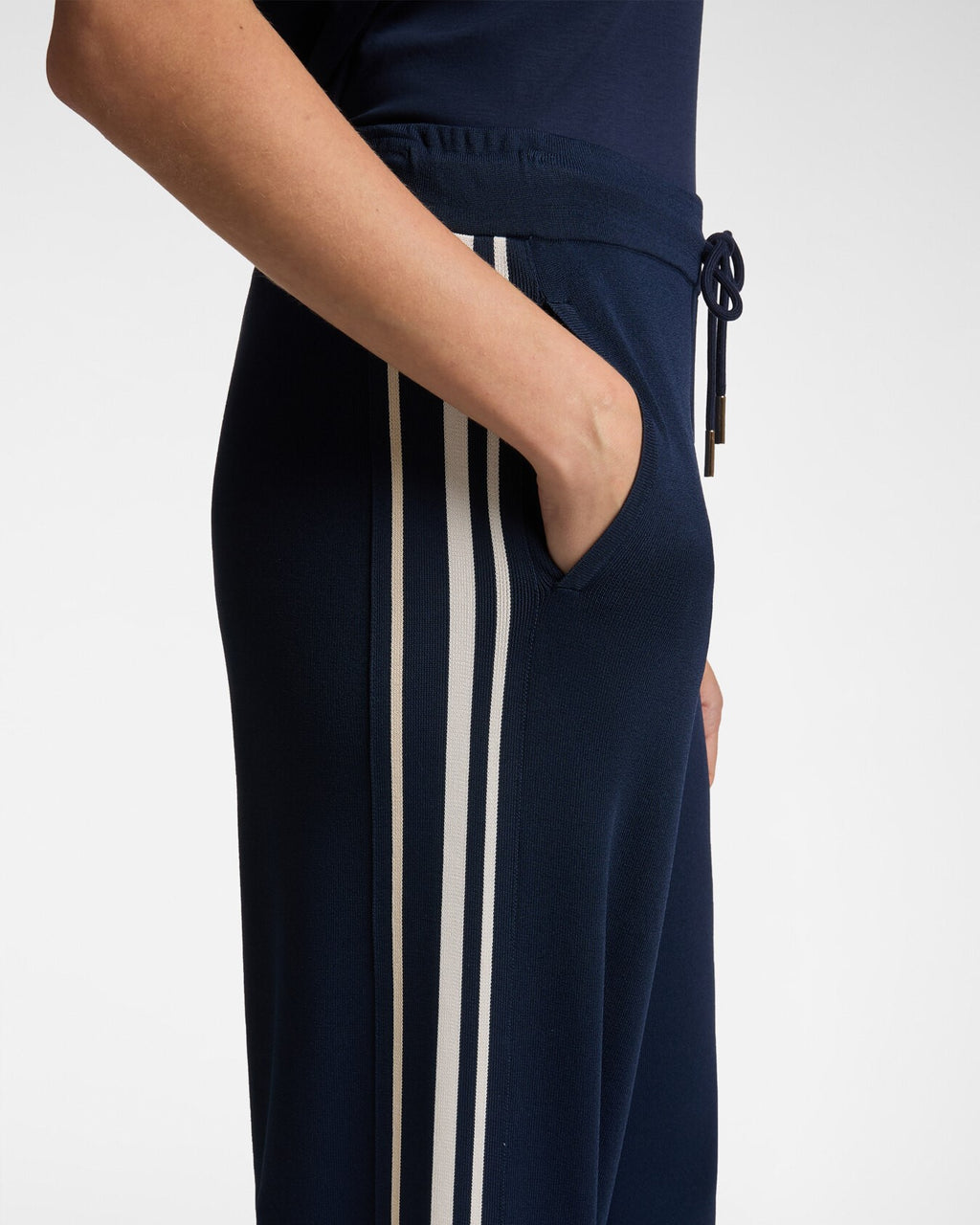 Pantaloni in maglia con bordi a righe