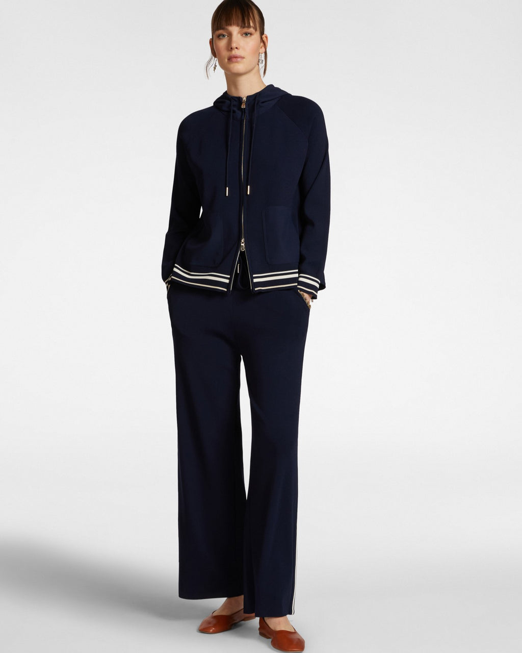 Pantaloni in maglia con bordi a righe