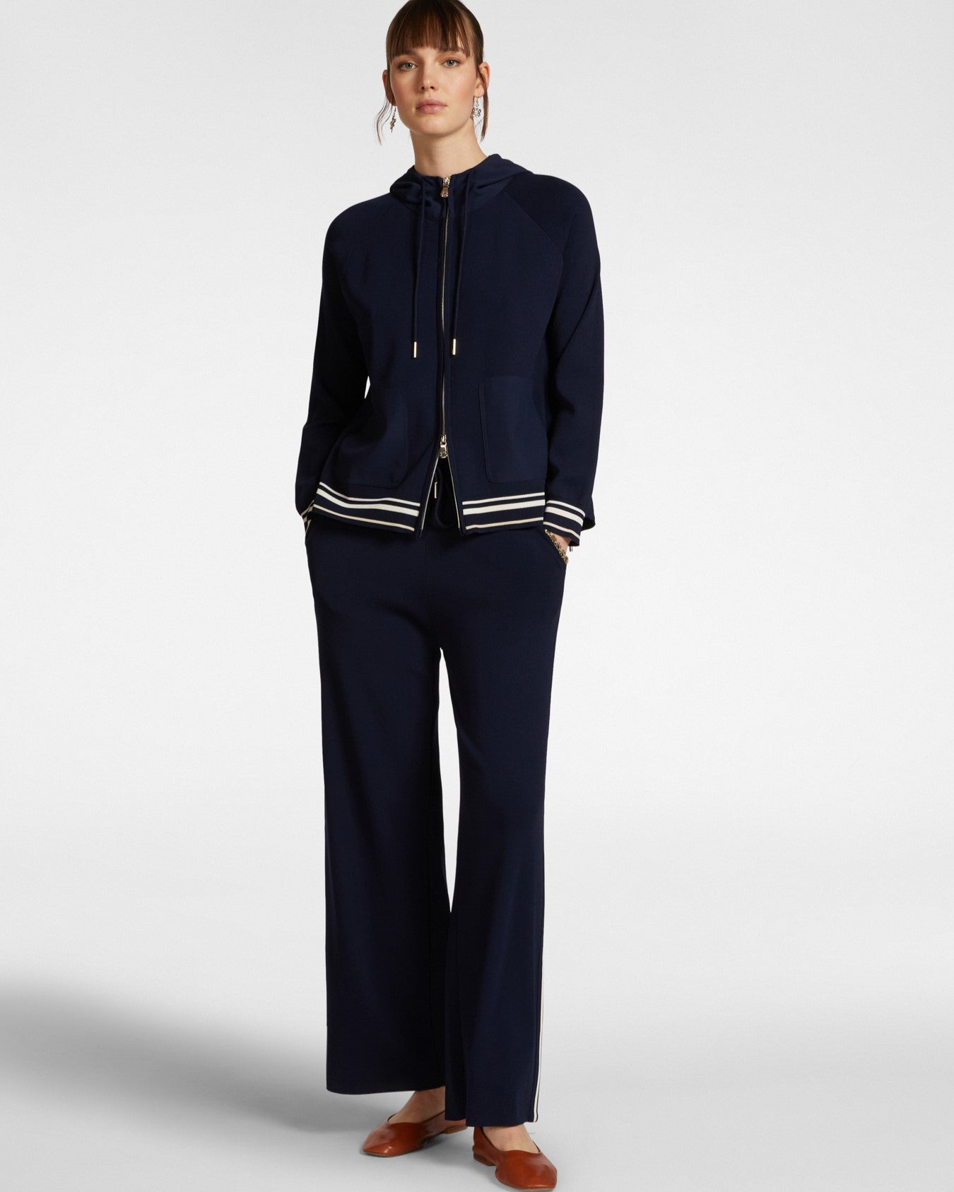 Pantaloni in maglia con bordi a righe