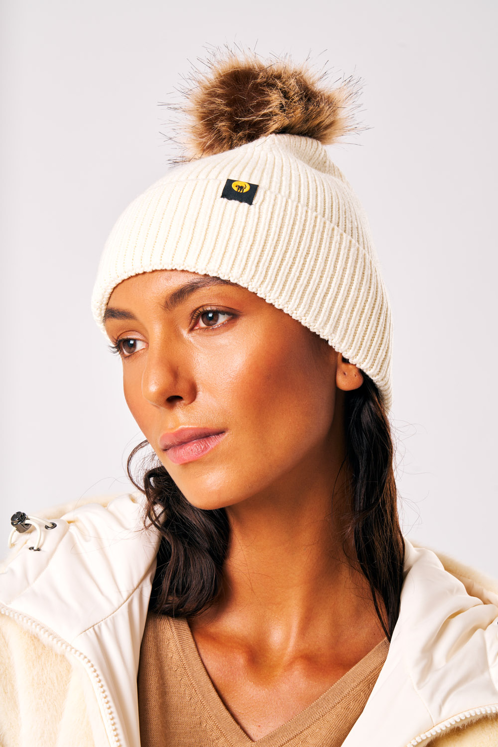 Cappellino in maglia con pompon Vega