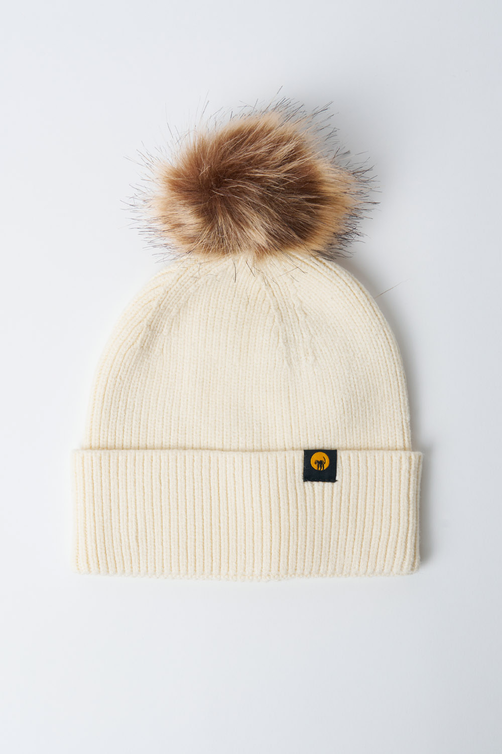 Cappellino in maglia con pompon Vega