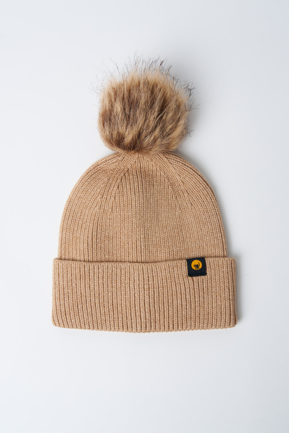 Cappellino in maglia con pompon Vega