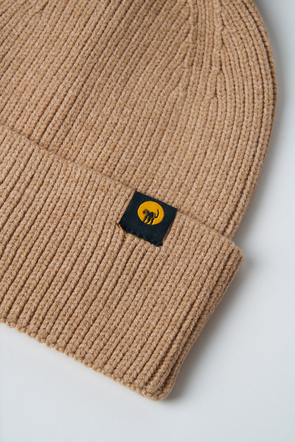Cappellino in maglia con pompon Vega