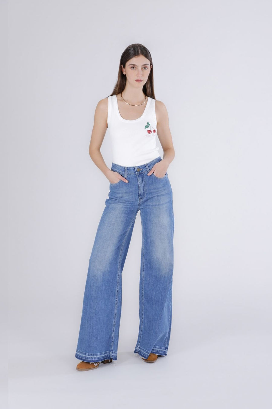Pantalone palazzo con orlo sciolto