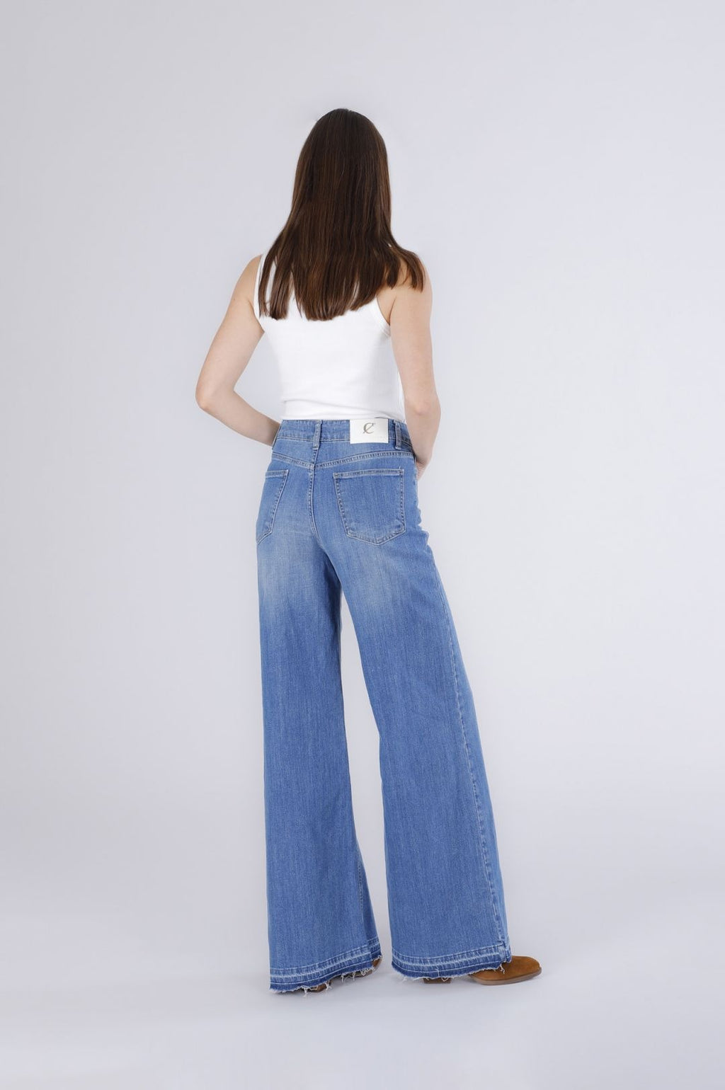Pantalone palazzo con orlo sciolto